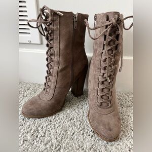 Ankle height suede heeled boots